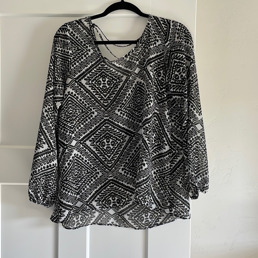 Charming Charlie blouse with criss-cross back